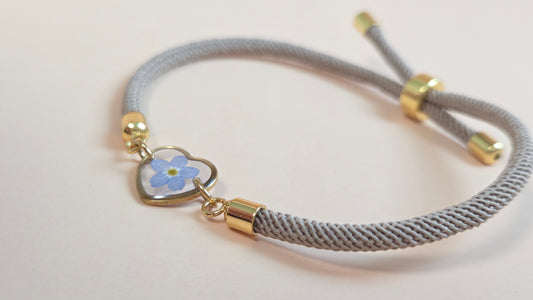 Kordelarmband mit Anhänger