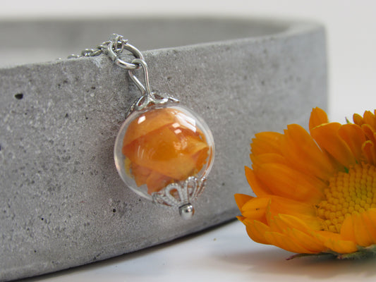 Halskette mit Glaskugel - Ringelblume